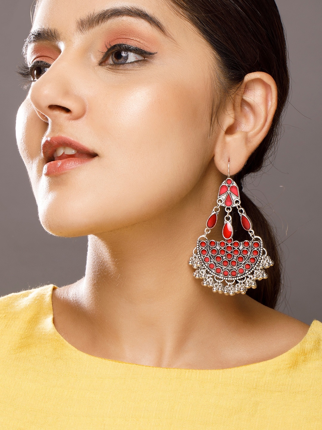 

Rubans Silver-Toned & Red Stone Studded Chandbalis Earrings