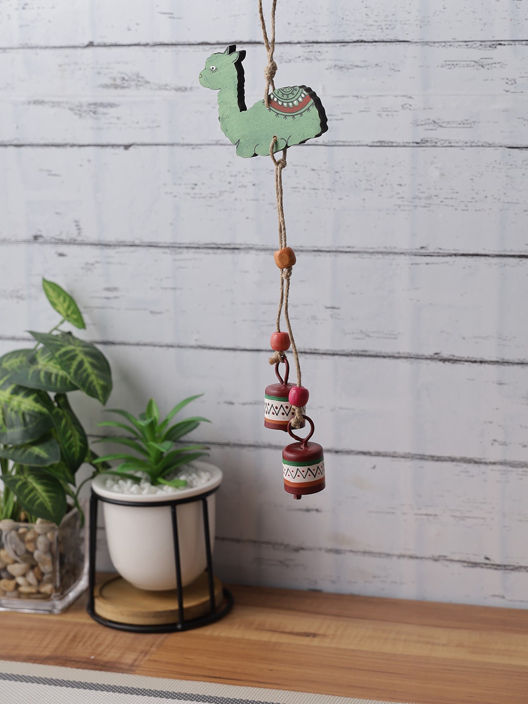 

Aapno Rajasthan Green & Maroon Wooden Lama Wall Hanging