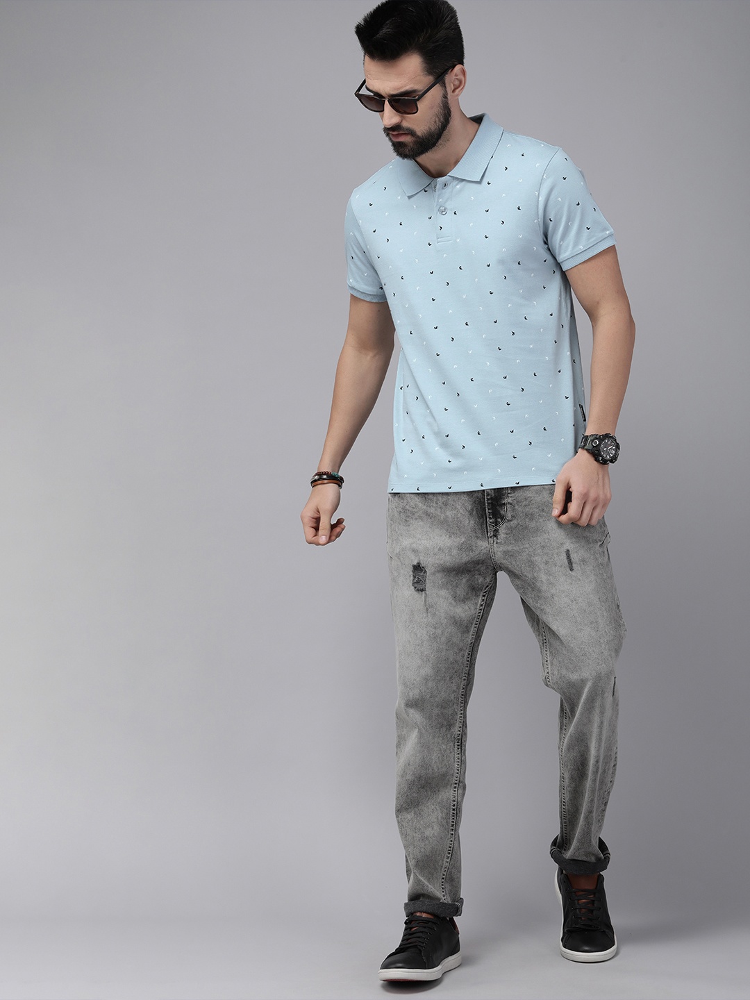 

The Roadster Lifestyle Co. Men Blue Printed Polo Collar Slim Fit Pure Cotton T-shirt