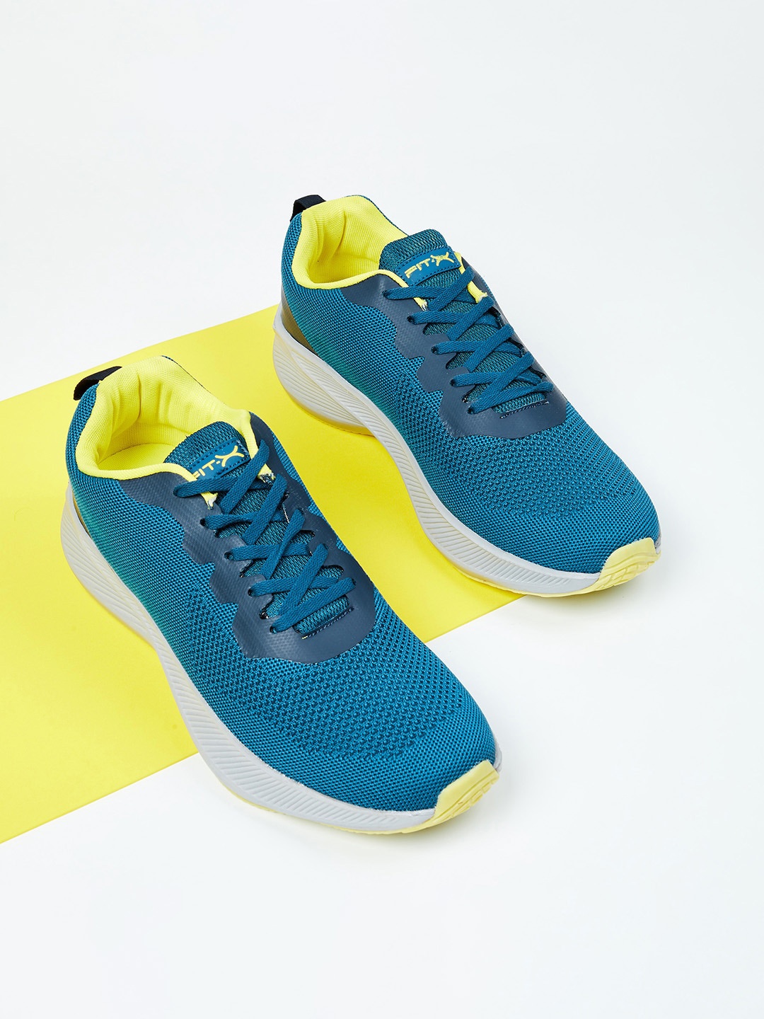 

max Men Teal Sneakers