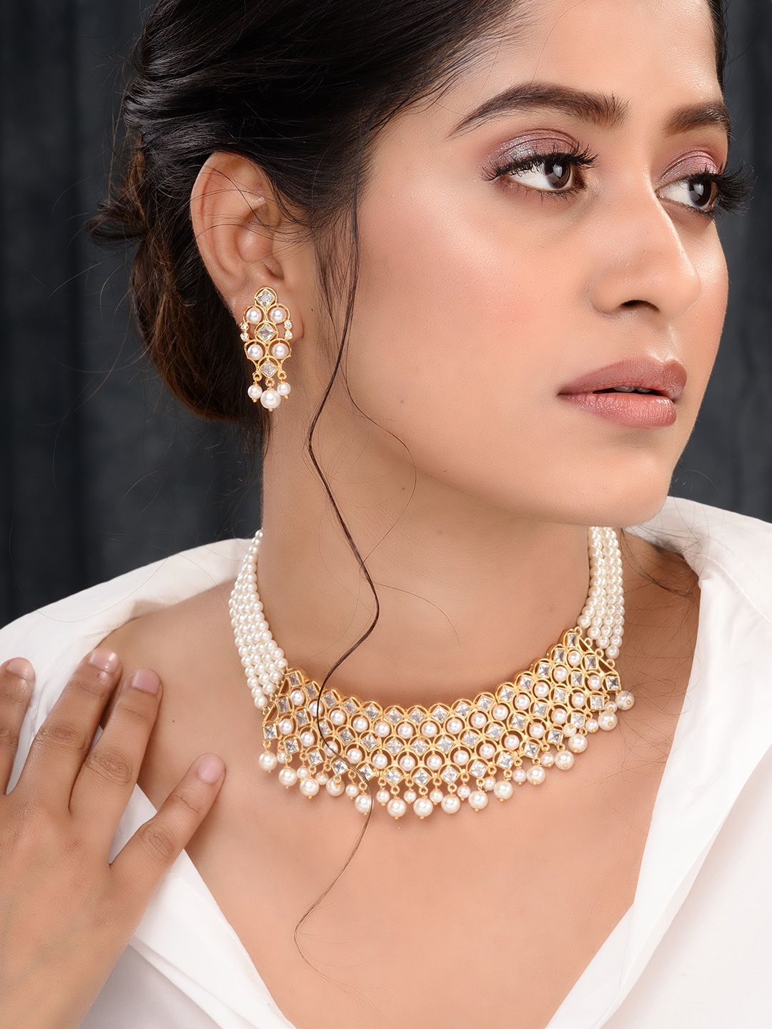 

Saraf RS Jewellery Gold-Plated & White Pearls Studded Multistrands Choker Jewellery Set