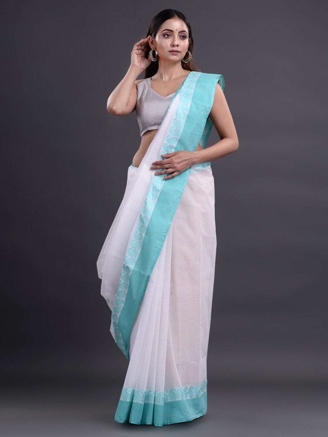

Mitera White & Blue Pure Cotton Heavy Work Taant Saree