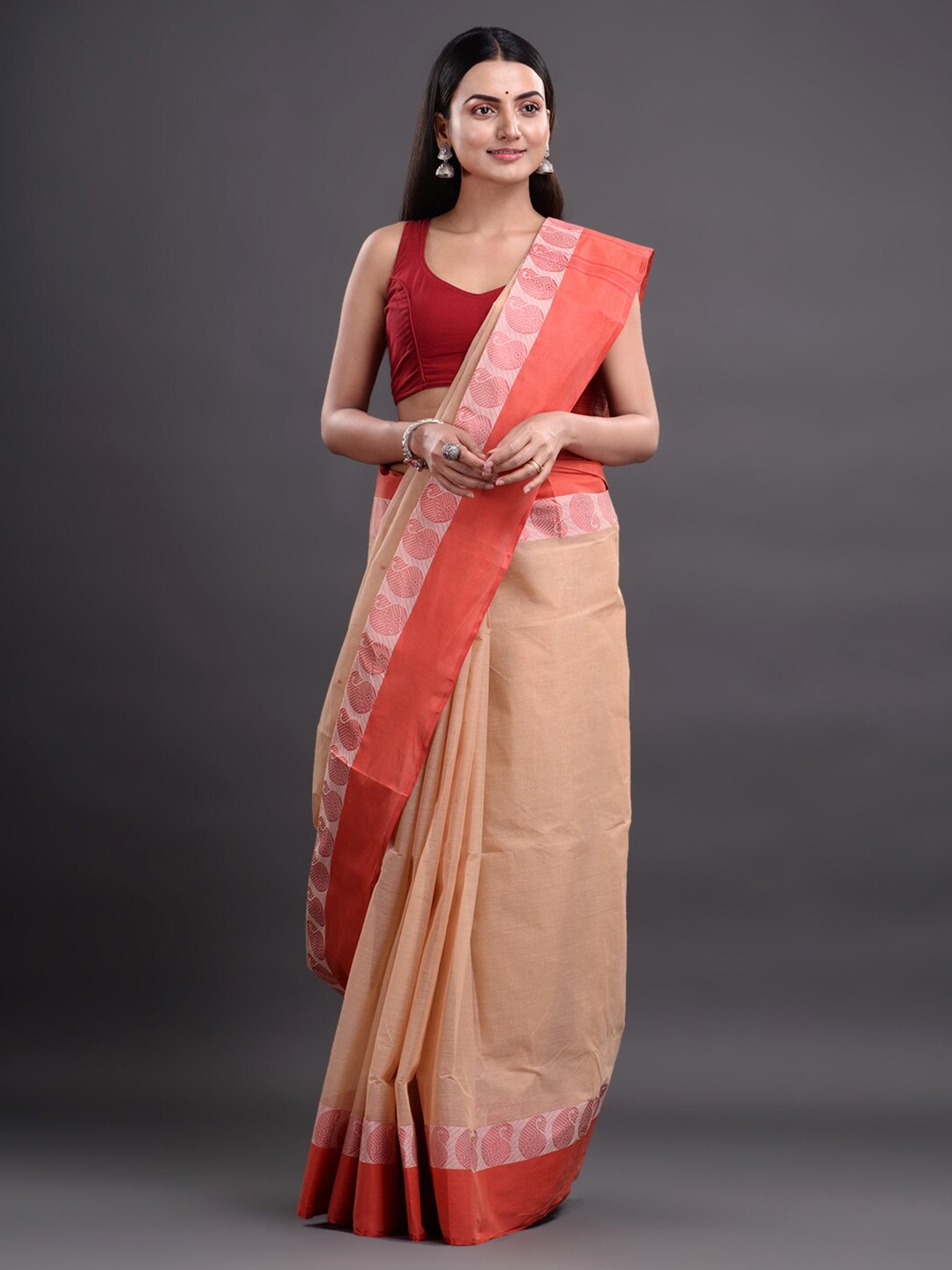 

Mitera Beige & Red Woven Design Pure Cotton Heavy Work Taant Saree