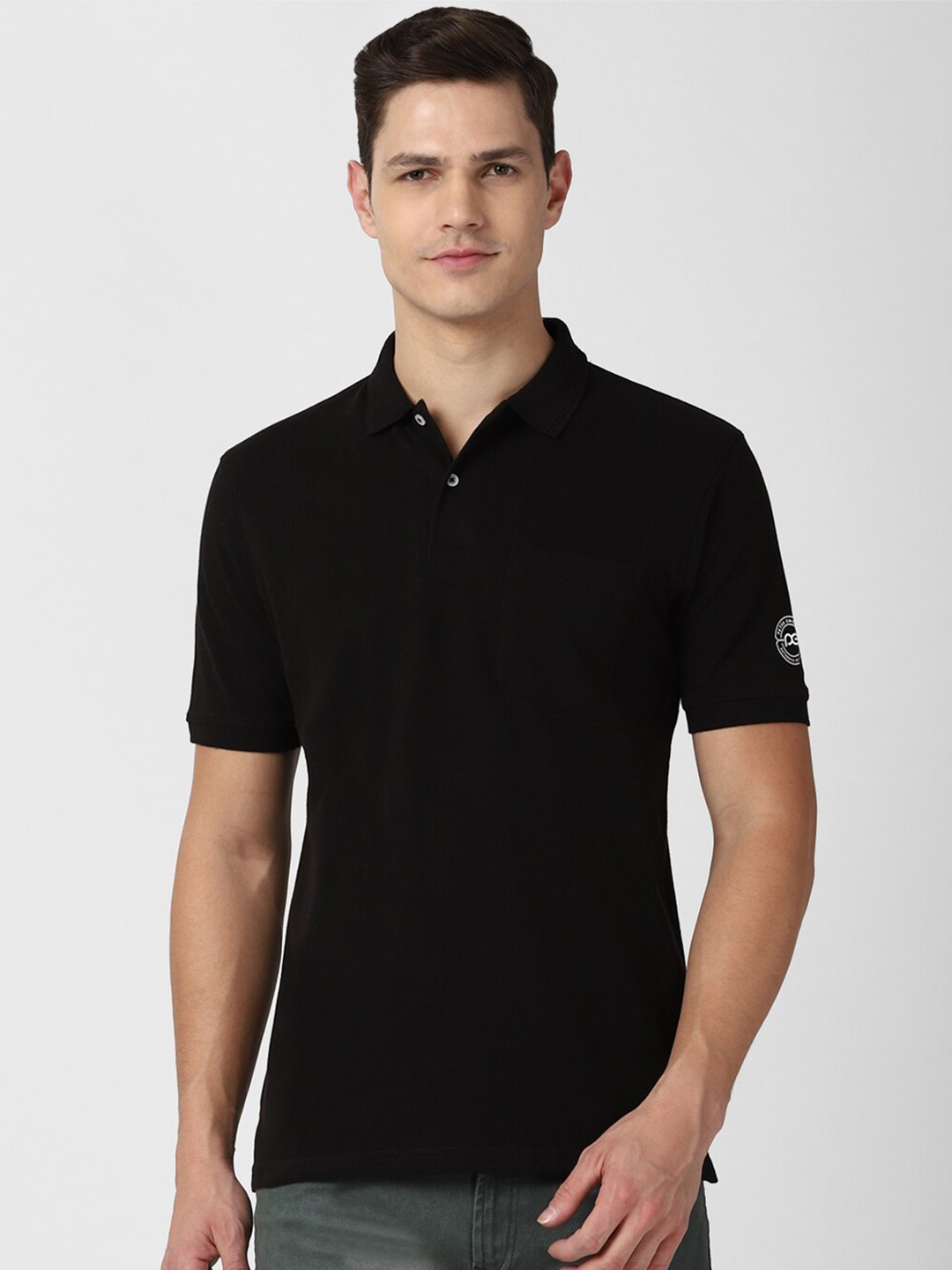 

Peter England Casuals Men Black Solid Polo Collar Cotton T-shirt