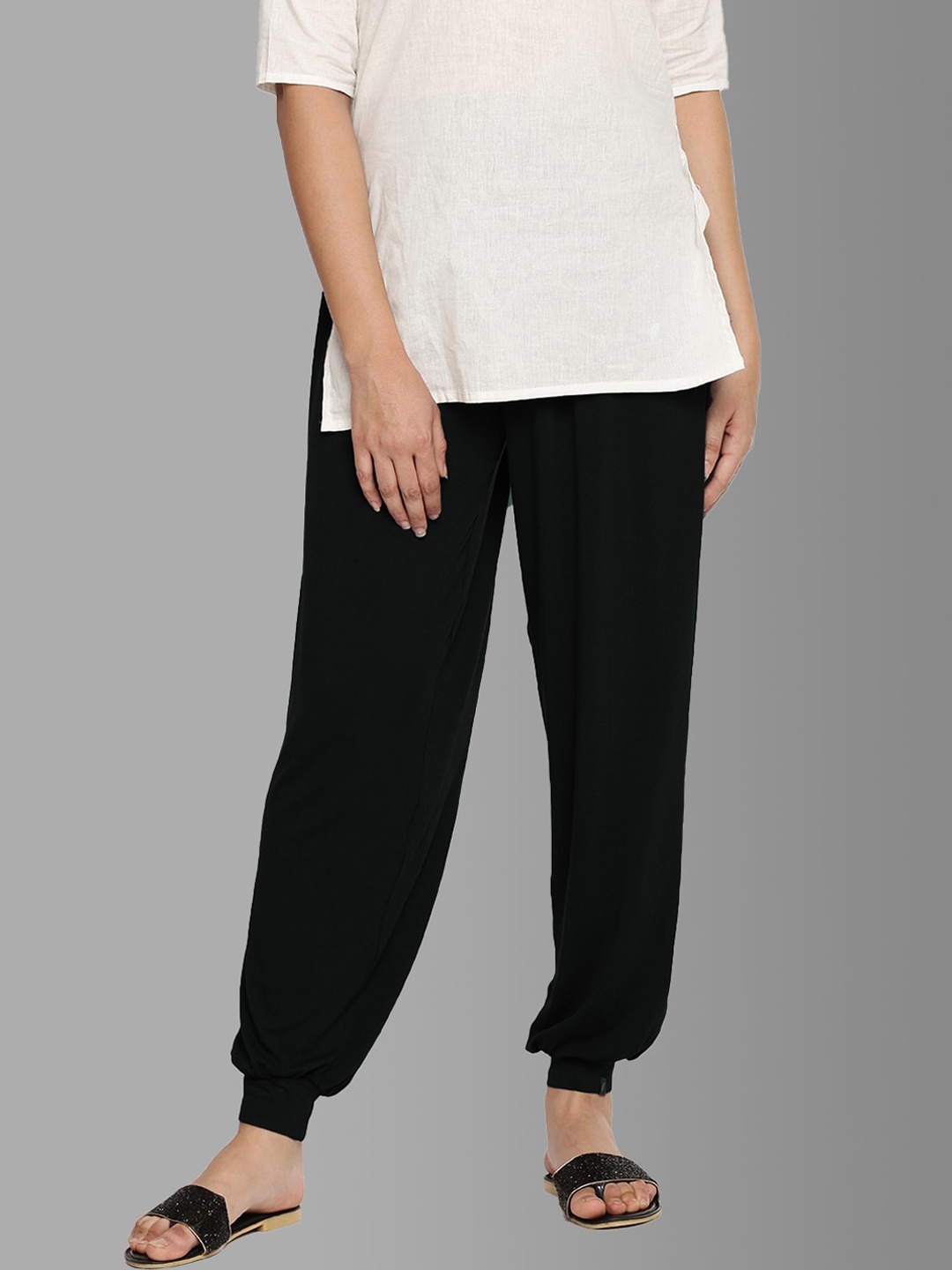 

Feather Soft Elite Black Solid Loose-Fit Harem Pants