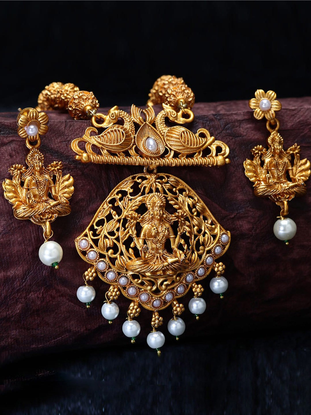 

ANIKAS CREATION Gold Plated & White Maa Laxmi Stone Studded Necklace With Earrrings