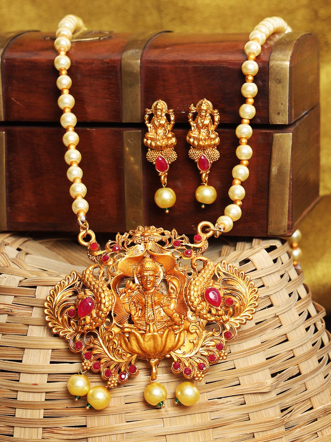 

ANIKAS CREATION Gold-Plated Red Stone-Studded Pearl Jewellery Set
