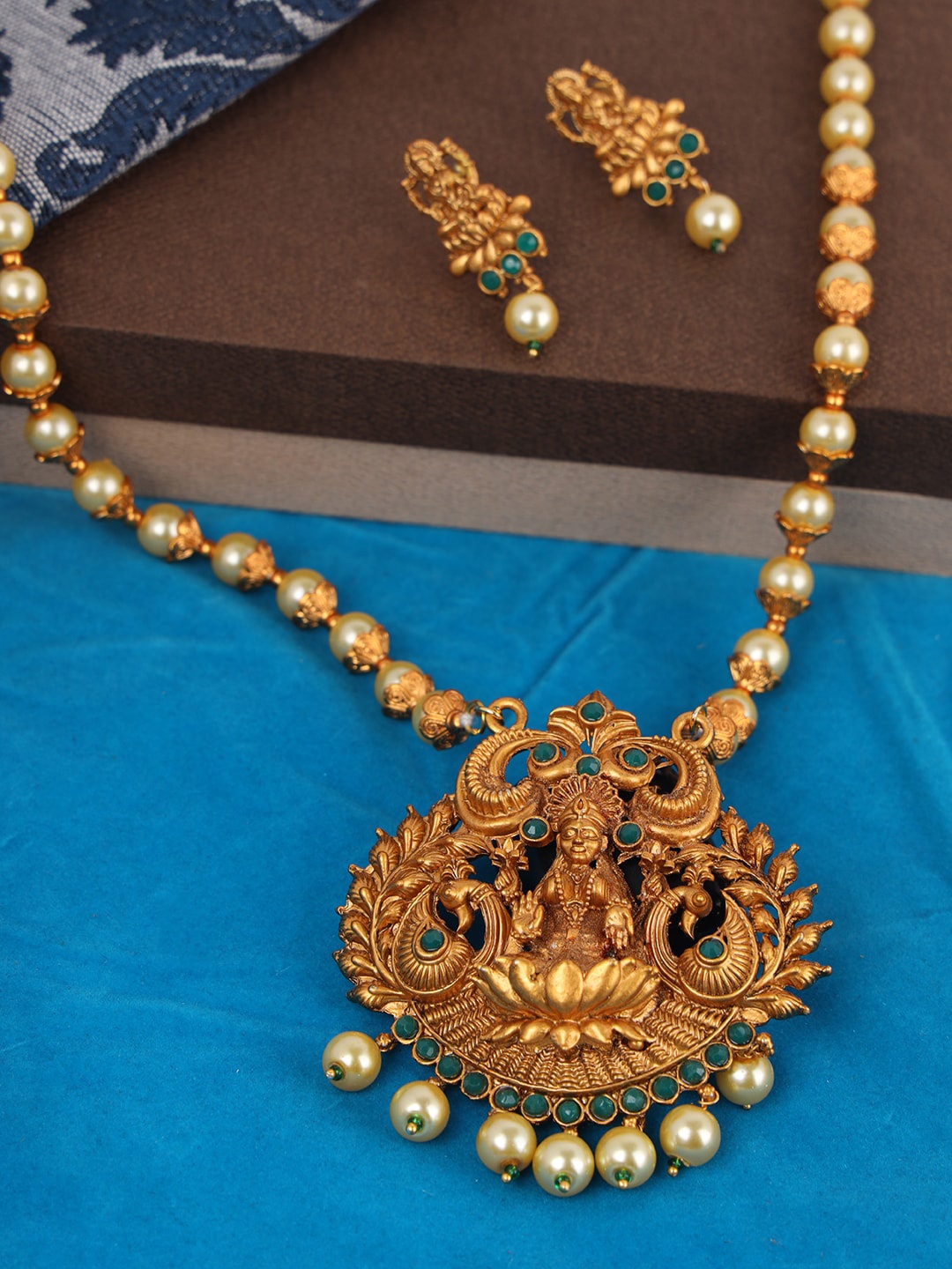 

ANIKAS CREATION Gold Plated Green Maa Laxmi Temple Jewellery