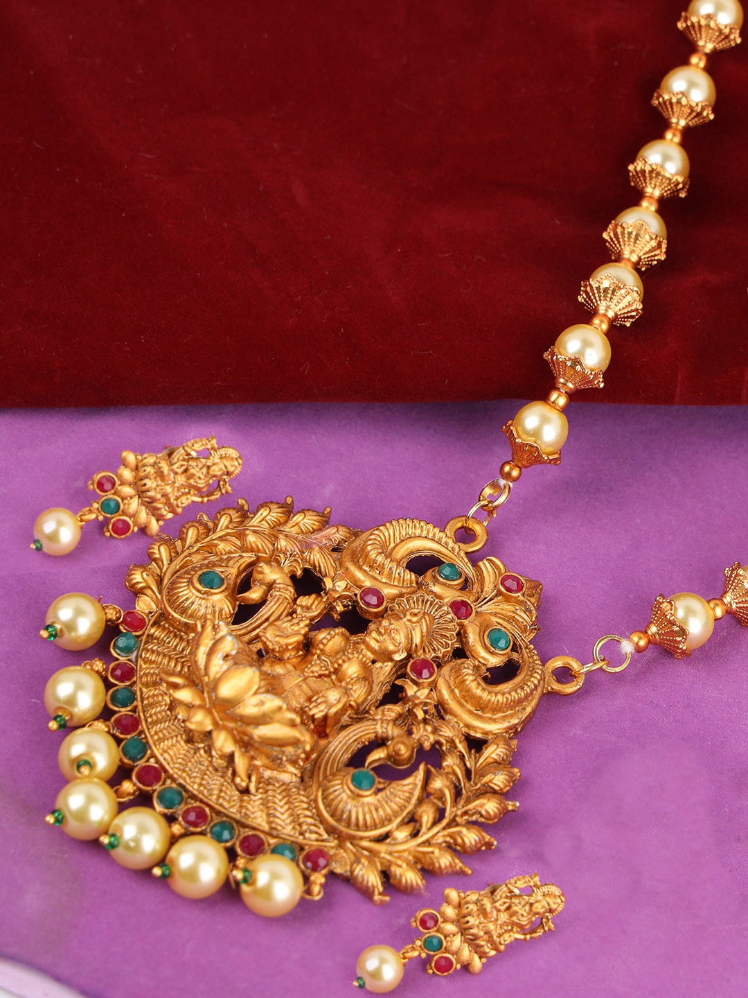 

ANIKAS CREATION Gold Plated Green & Red Temple Jewellery Set