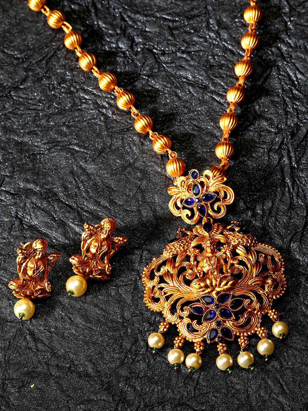 

ANIKAS CREATION Gold-Plated Blue & White Stone-Studded & Beaded Jewellery Set