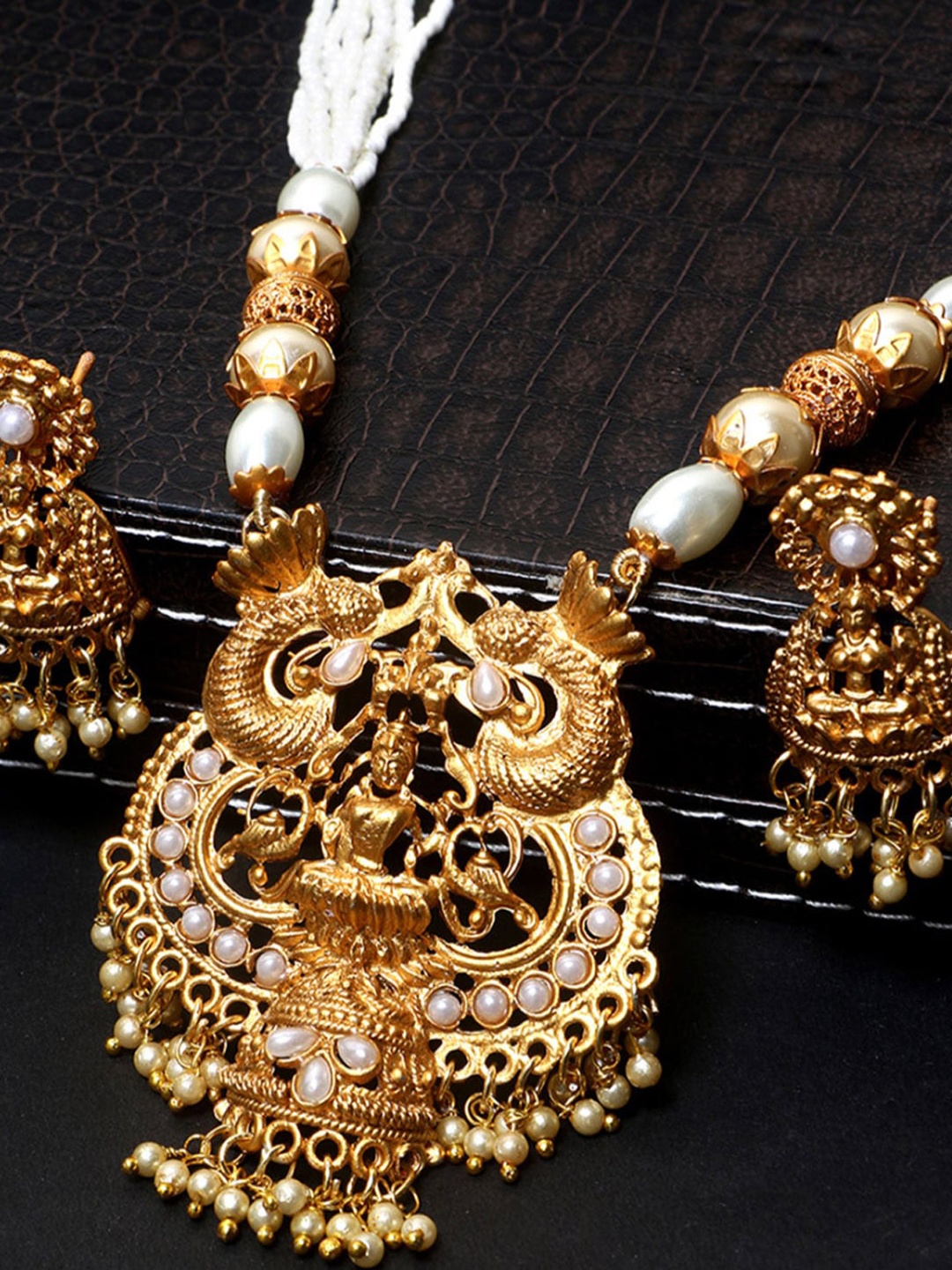 

ANIKAS CREATION Gold-Plated White Stone Studded Maa Laxmi Temple Jewellery Set