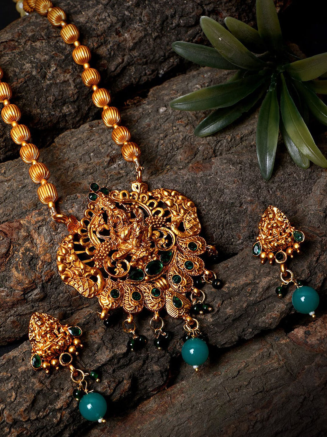 

ANIKAS CREATION Gold-Plated & Green Stone-Studded Jewellery Set