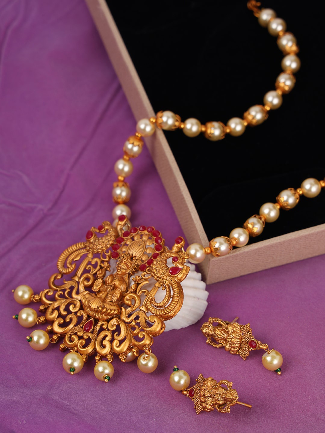 

ANIKAS CREATION Gold-Plated Red Stone-Studded Temple Jewellery Set