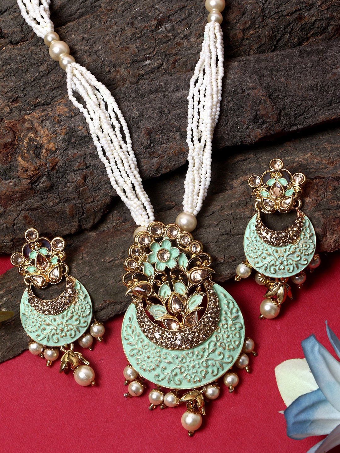 

ANIKAS CREATION Gold-Plated Green Stone Studded and Pearl Temple Jewellery Set