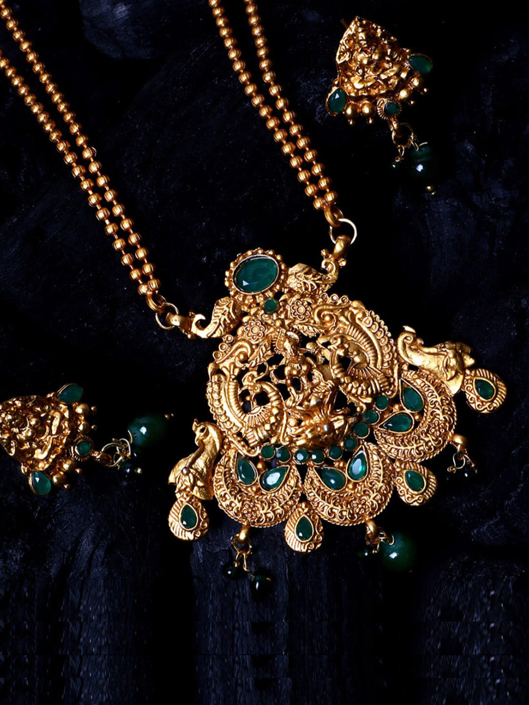 

ANIKAS CREATION Gold-Plated Green Stone-Studded & Beaded Jewellery Set