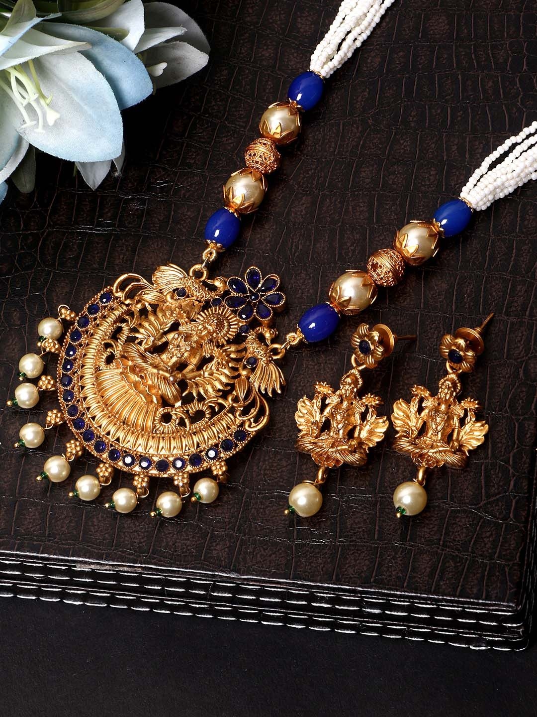 

ANIKAS CREATION Women Gold-Plated Stone Studded Maa Laxmi Temple Jewellery Set, Blue