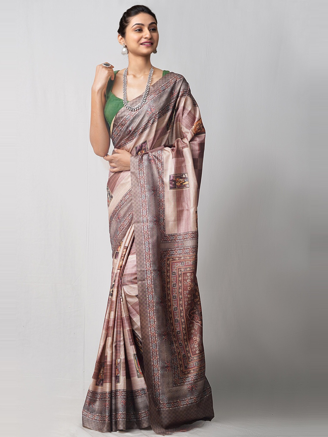 

Unnati Silks Grey & Cream Ethnic Motifs Printed Patola Saree