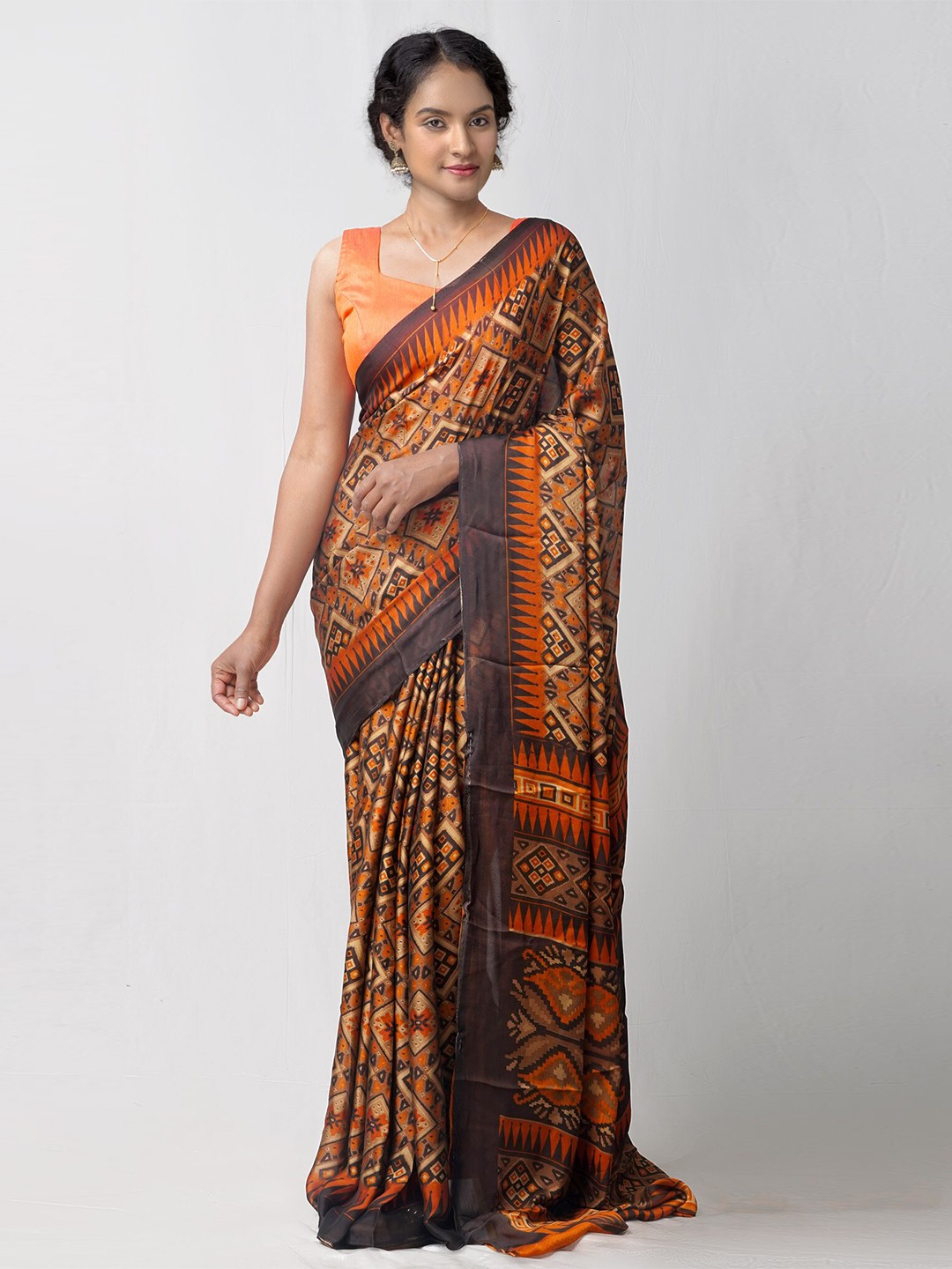

Unnati Silks Multicoloured Ethnic Motifs Silk Blend Patola Saree, Multi