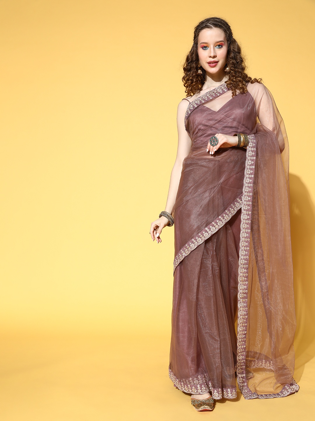 

Inddus Brown Saree with Embroidered border