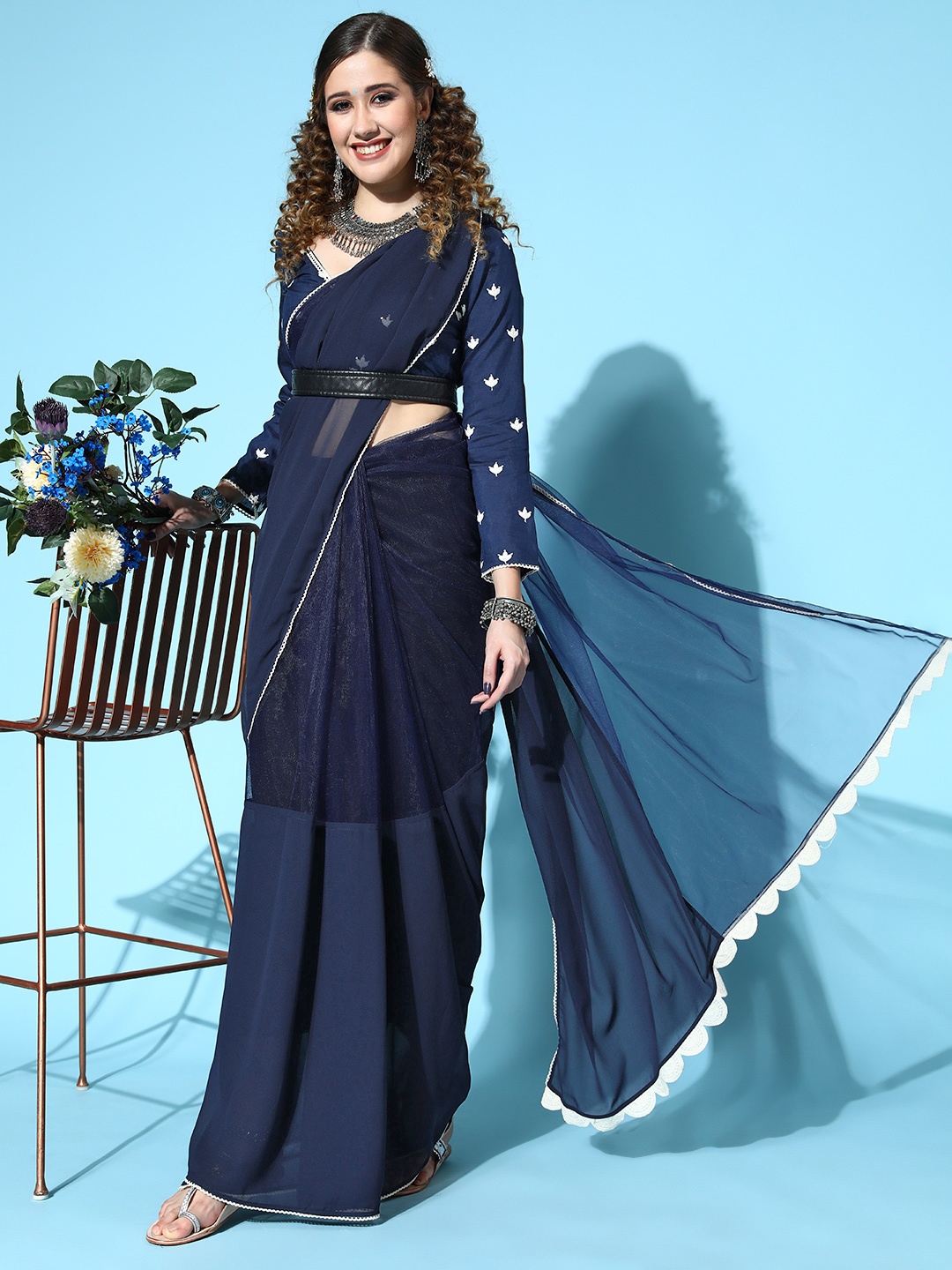 

Inddus Women Navy Blue Georgette Saree with Cotton Blend Blouse Piece