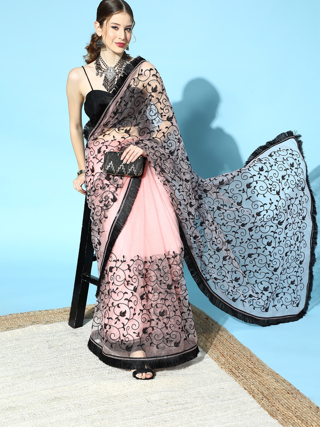 

Inddus Women Pink and Black Floral Embellished Net Saree with Silk Blend Blouse Piece
