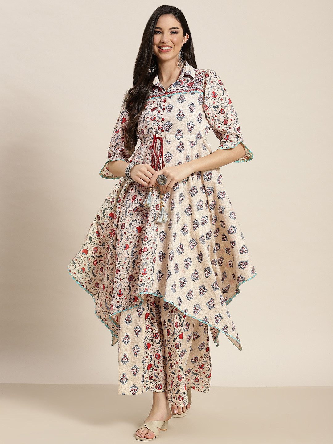 

Juniper Women Beige & Red Ethnic Motifs Printed Asymmetric Kurta