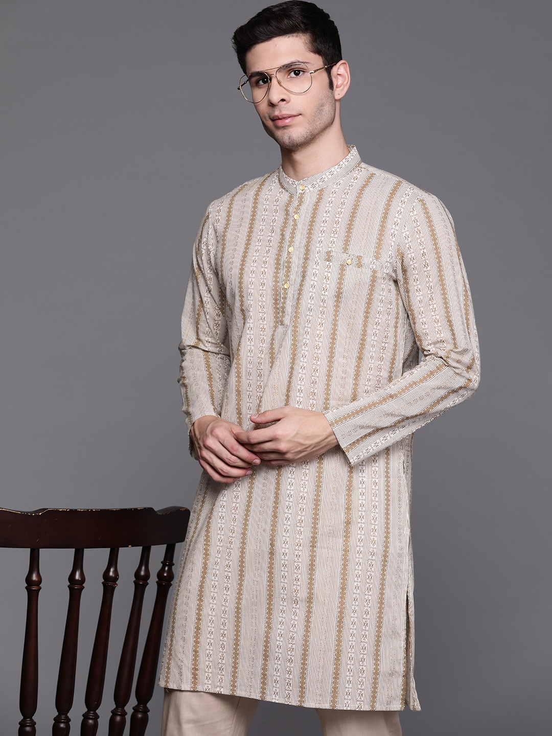 

Indo Era Men Off White & Golden Ethnic Motifs Printed Pure Cotton Kurta