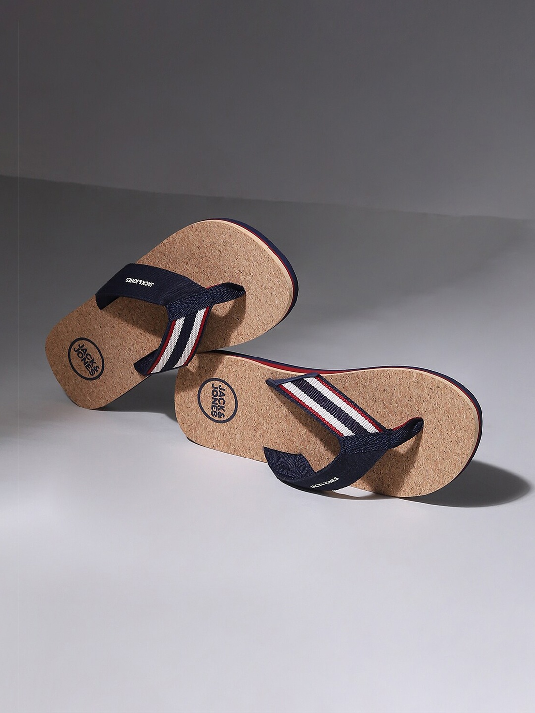 

Jack & Jones Men Beige & Navy Blue Striped Slip-On Flip flops