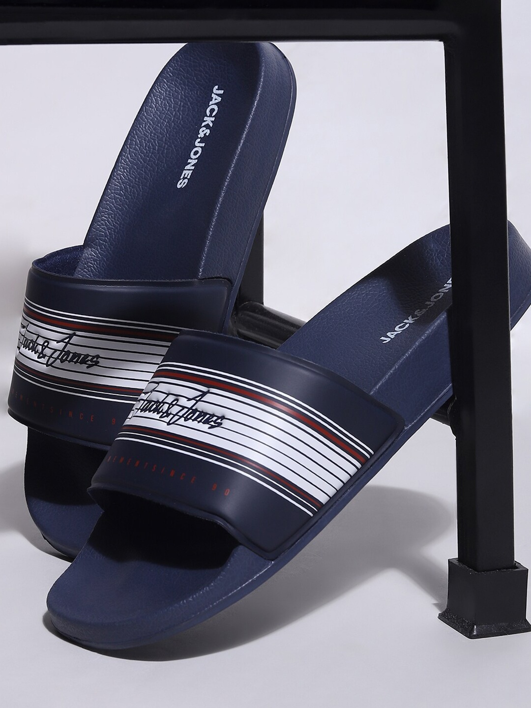 

Jack & Jones Men Navy Blue & White Printed Sliders
