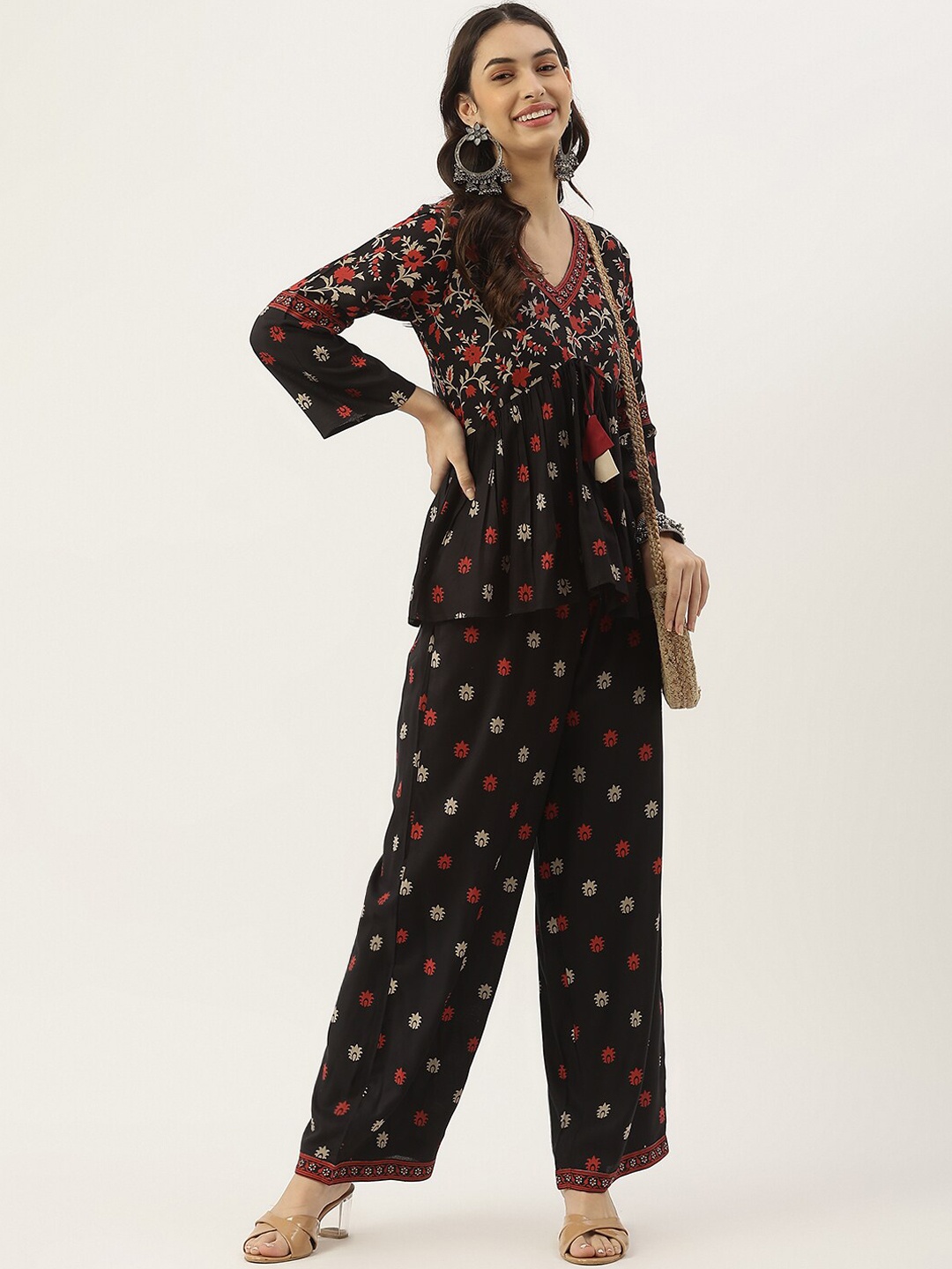 

Rustorange Women Black Floral Embroidered Empire Liva Kurti with Trousers