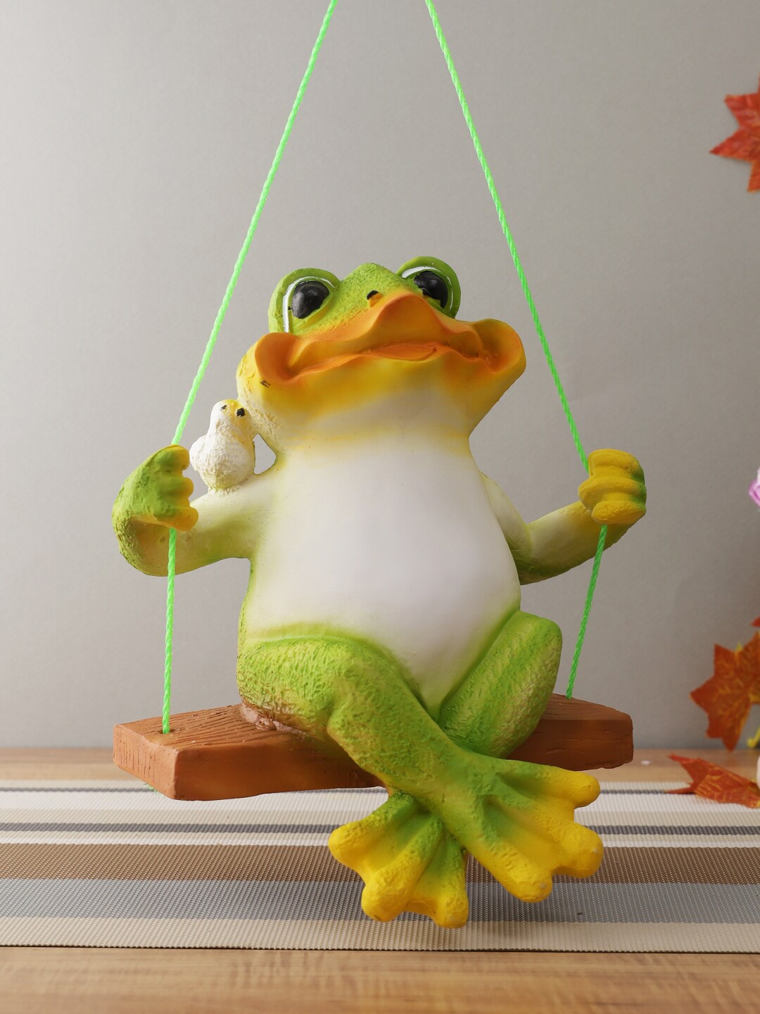 

CraftVatika Multi Polyresin Frog on Swing Hanging Showpiece