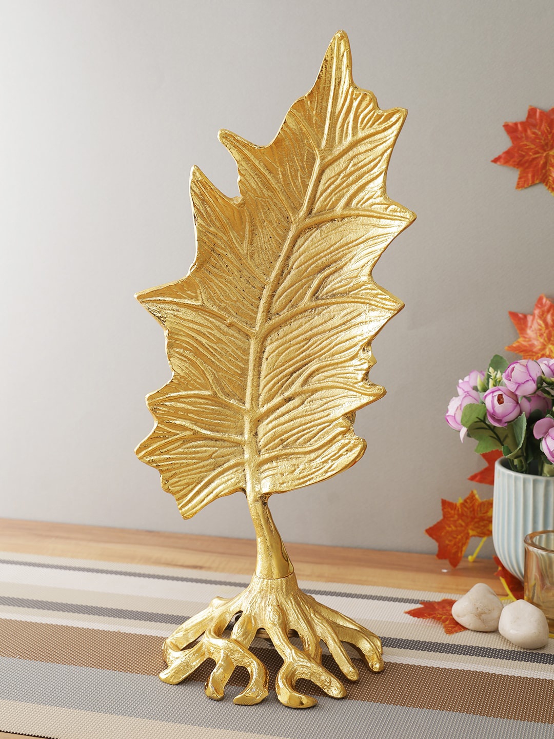 

CraftVatika Gold-Toned Textured Leaf Showpiece