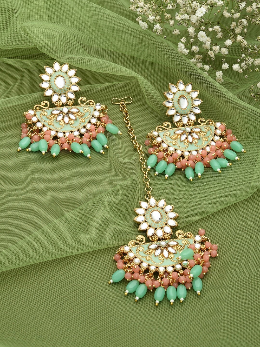 

Zaveri Pearls Gold-Plated Green & White Stone-Studded & Pearl Beaded Jewellery Set