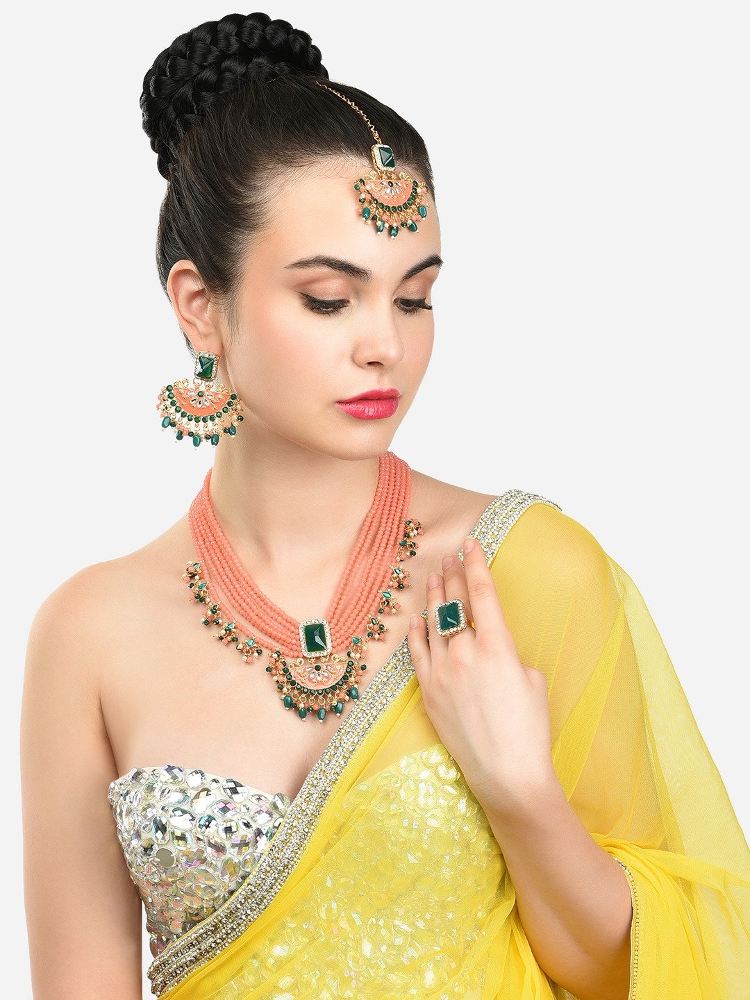 

Zaveri Pearls Gold-Plated & Peach-Coloured Stone-Studded Pearl Beaded Jewellery Set