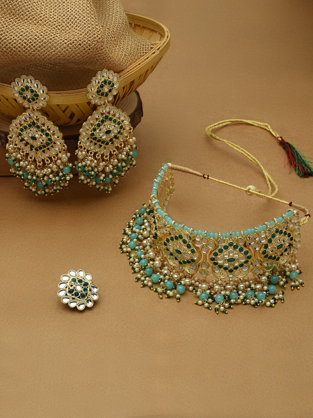 

Zaveri Pearls Gold- Plated Green & White Stone Studded & Beaded Jewellery Set