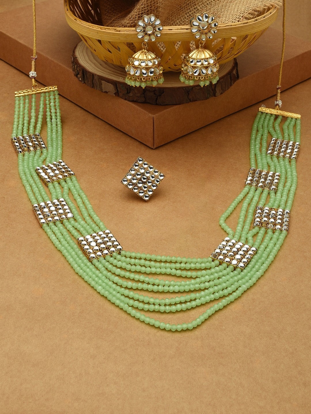 

Zaveri Pearls Gold- Plated Green & White Stone Studded & Beaded Jewellery Set