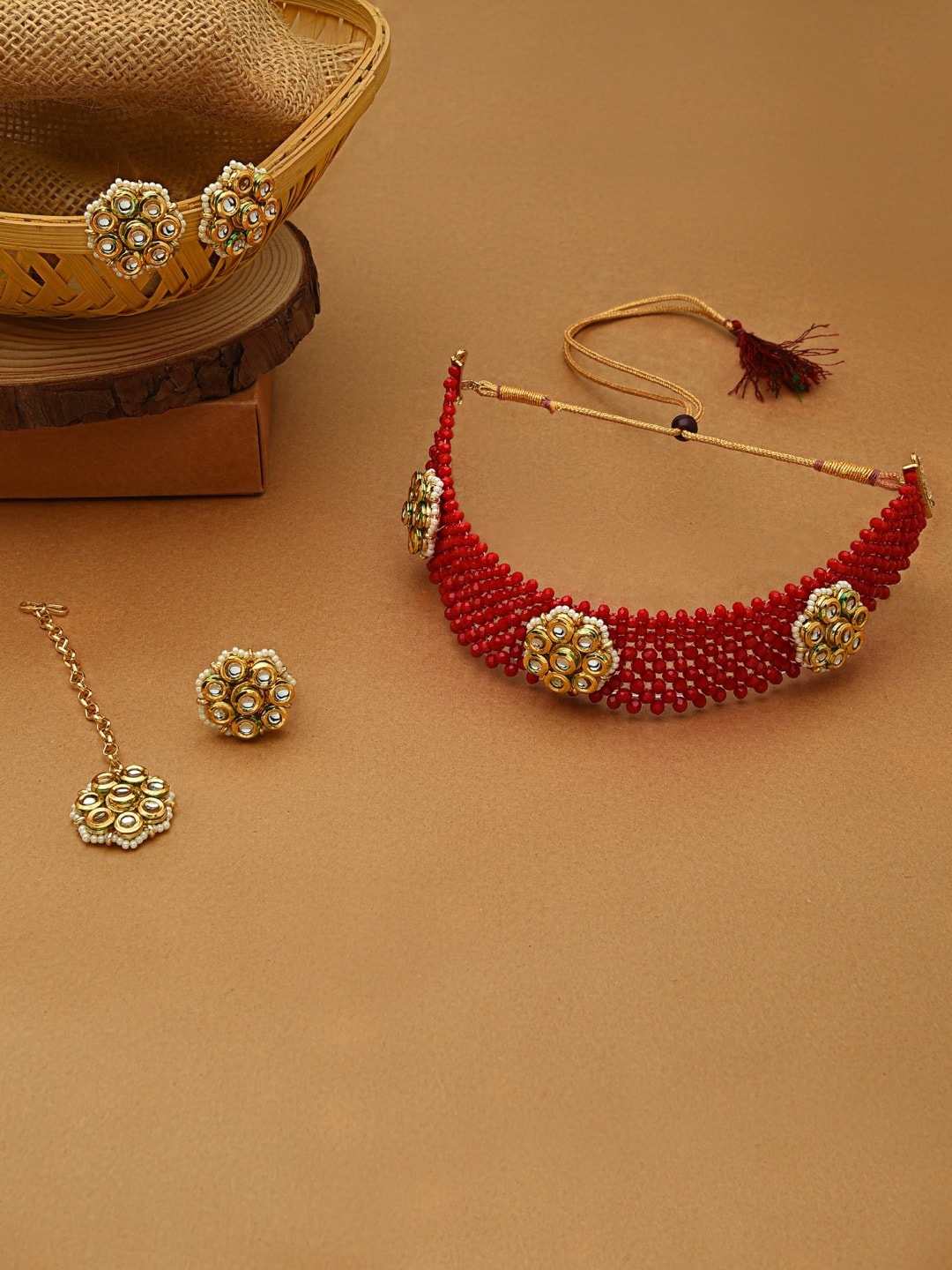 

Zaveri Pearls Gold-Plated Red & White Stone-Studded & Pearl Beaded Jewellery Set