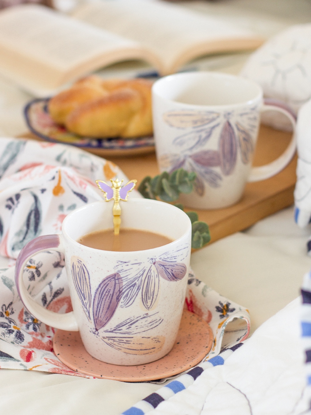 

The Wishing Chair White & Purple and Hand Painted Printed Stoneware Glossy Mugs