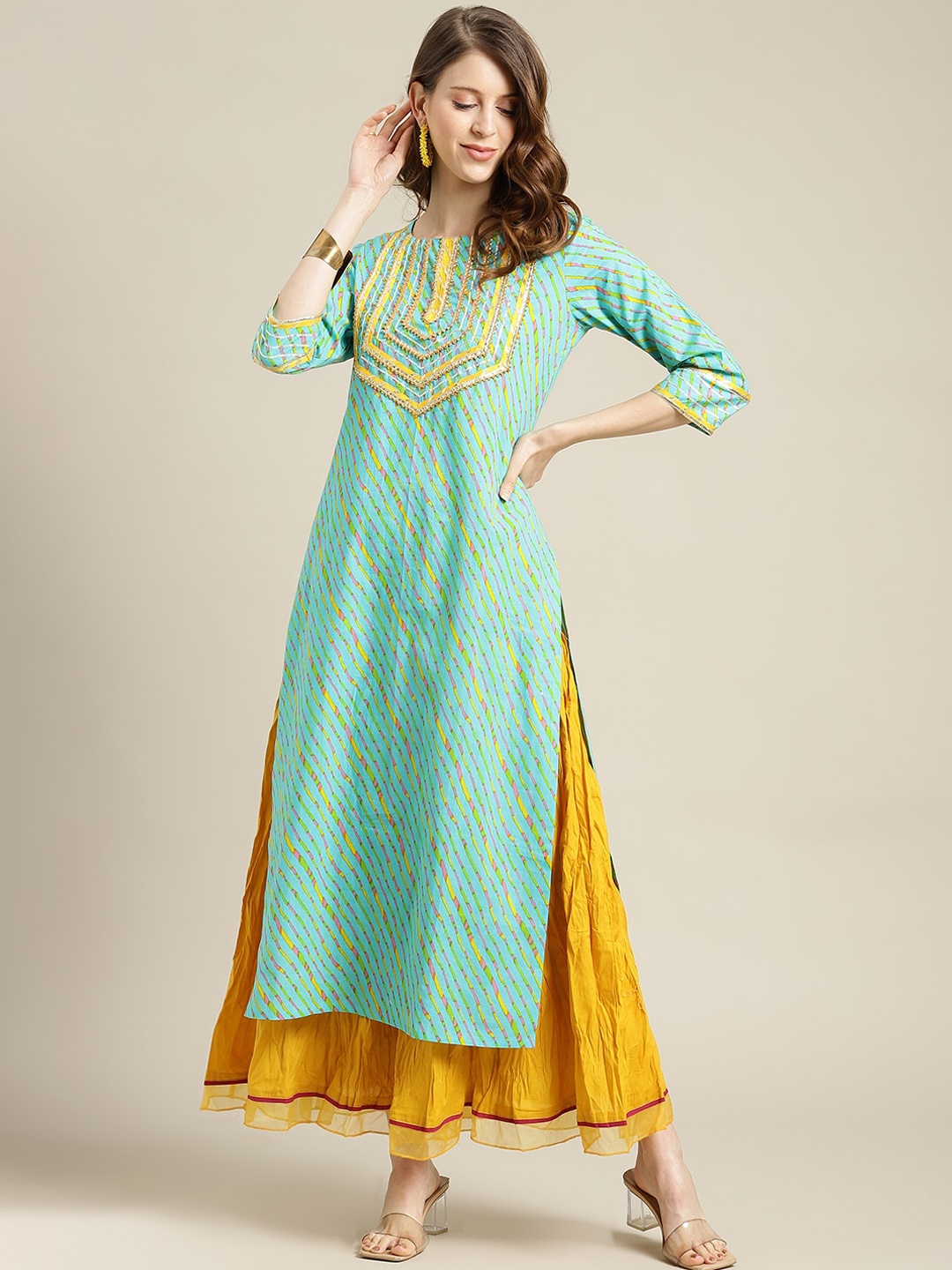 

Varanga Women Turquoise Blue & Yellow Striped Straight Kurta