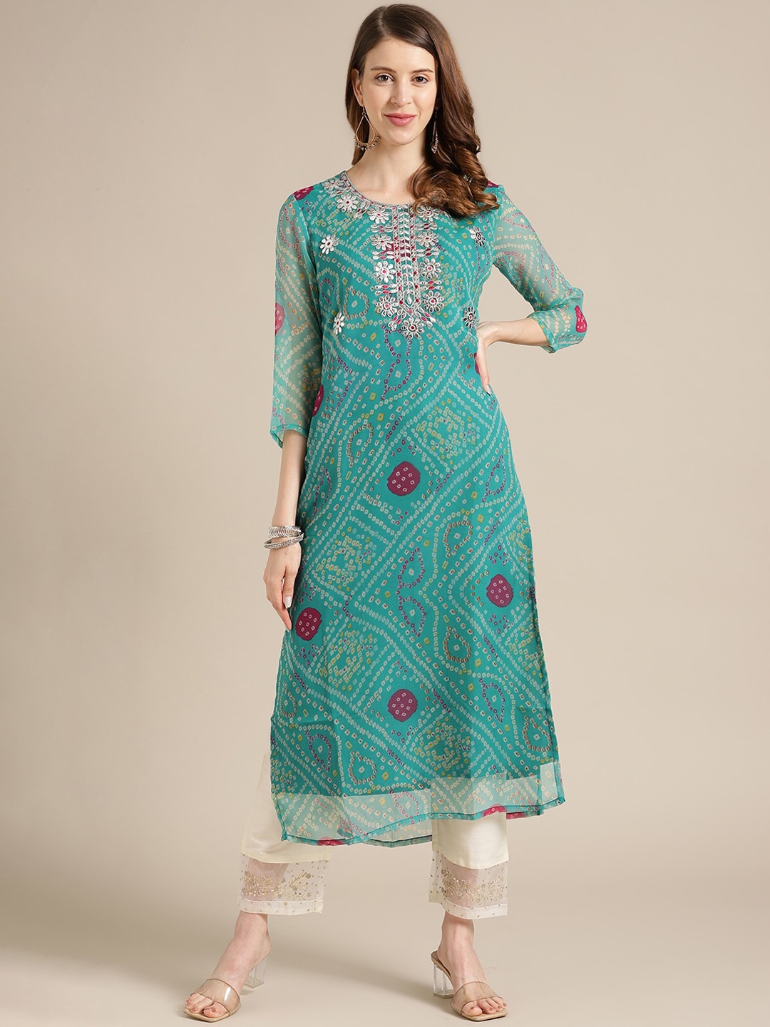 

Varanga Women Turquoise Blue Printed Thread Work Georgette Kurta