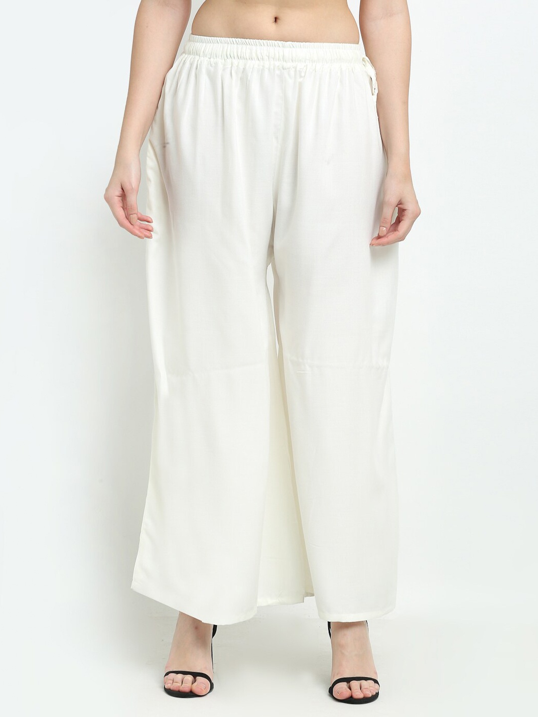 

TAG 7 Women Off White Solid Flared Fit Palazzos