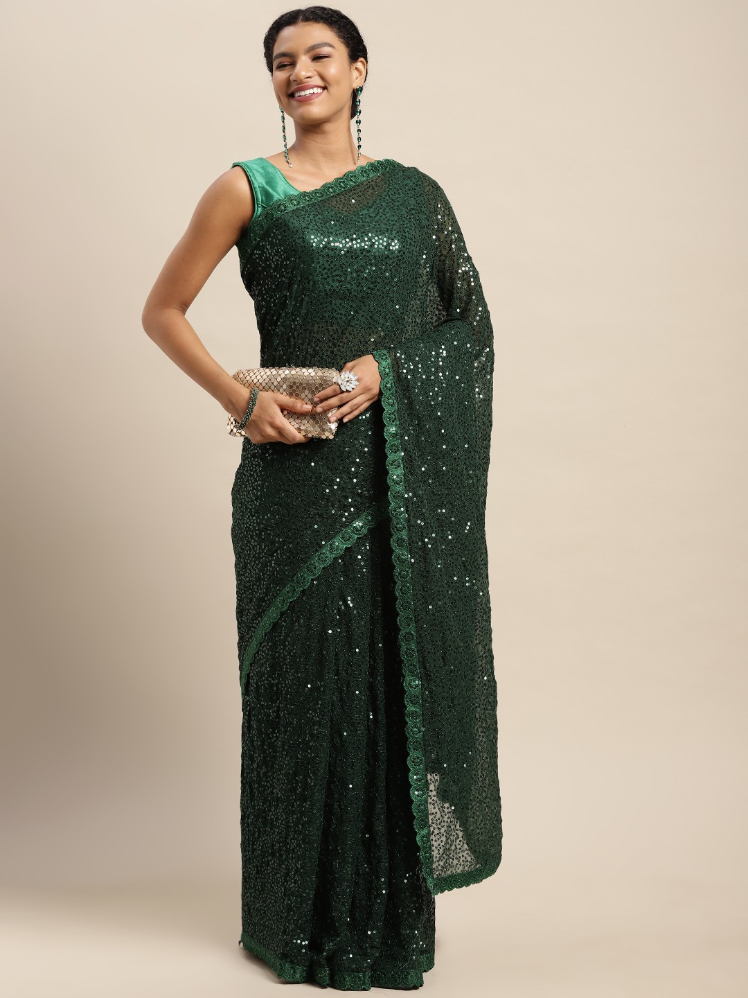 

Mitera Green Sequinned Saree