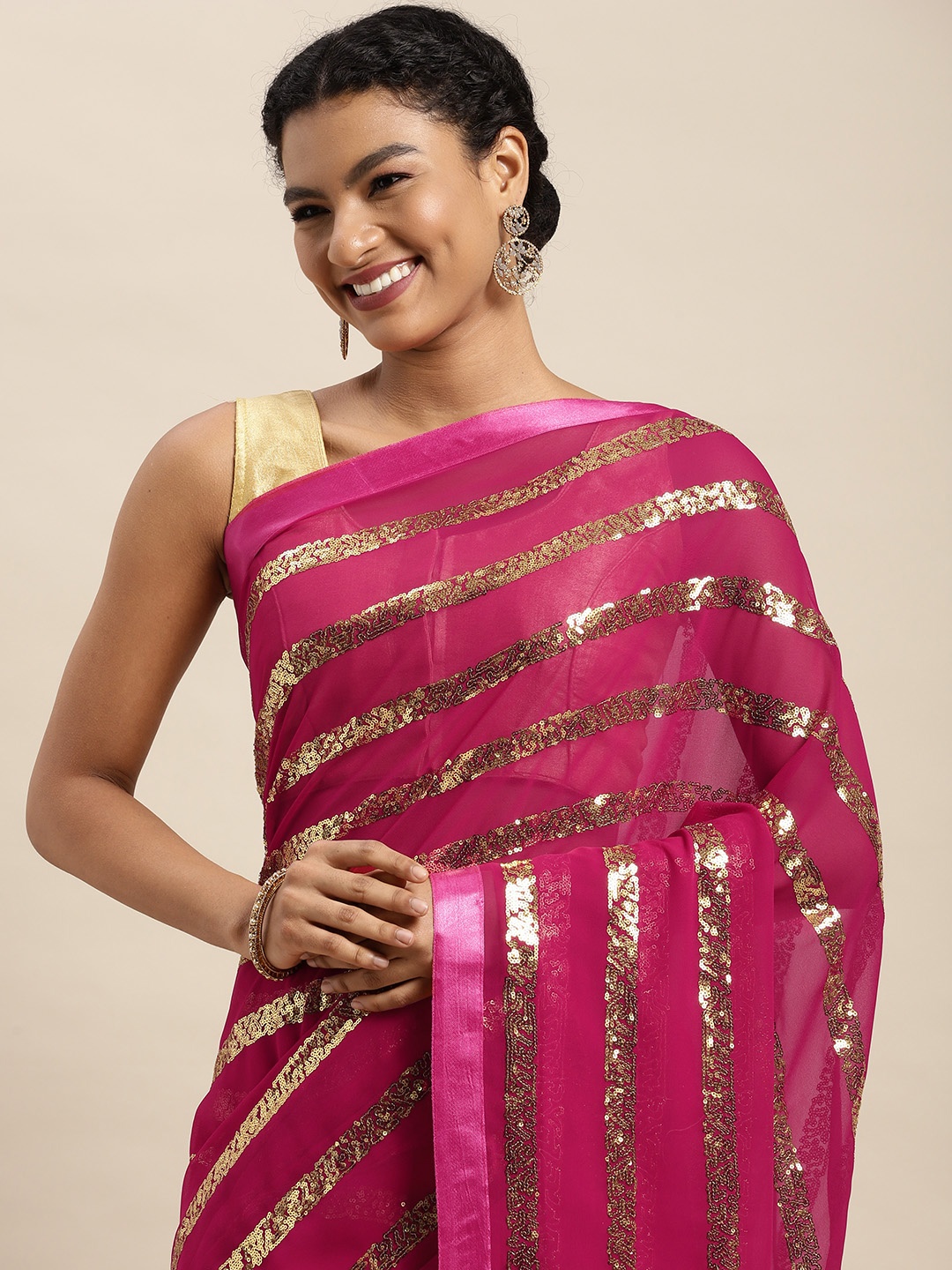 

Mitera Pink & Golden Embellished Saree