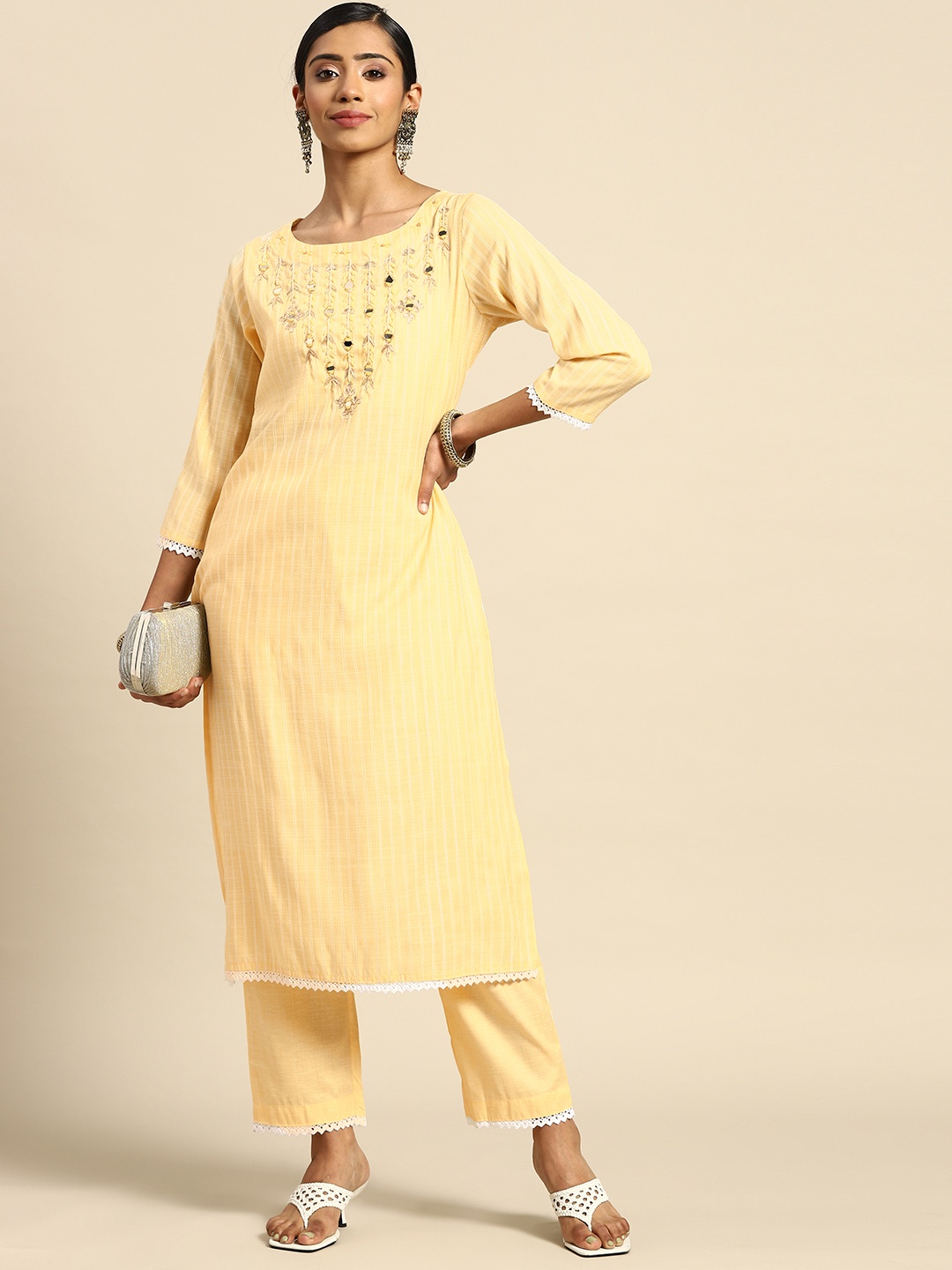 

Prakhya Women Yellow Yoke Design Thread Work Kurta with Palazzos
