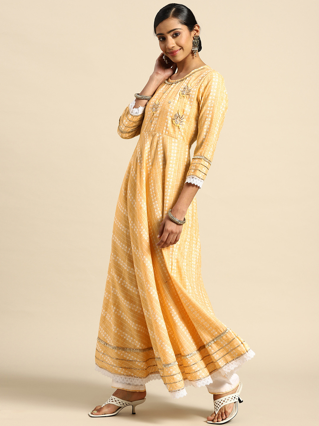 

Prakhya Women Yellow Yoke Design Panelled Beads and Stones Kurta with Palazzos
