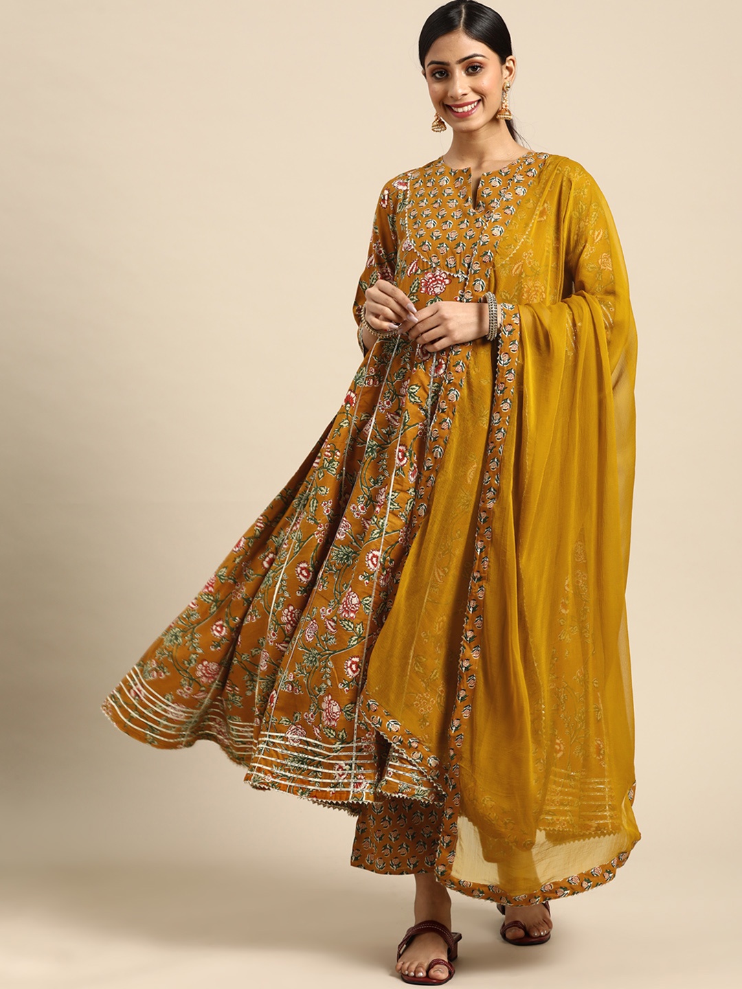 

Prakhya Women Mustard Yellow Ethnic Motifs Printed Panelled Kurta with Palazzos & With Dupatta