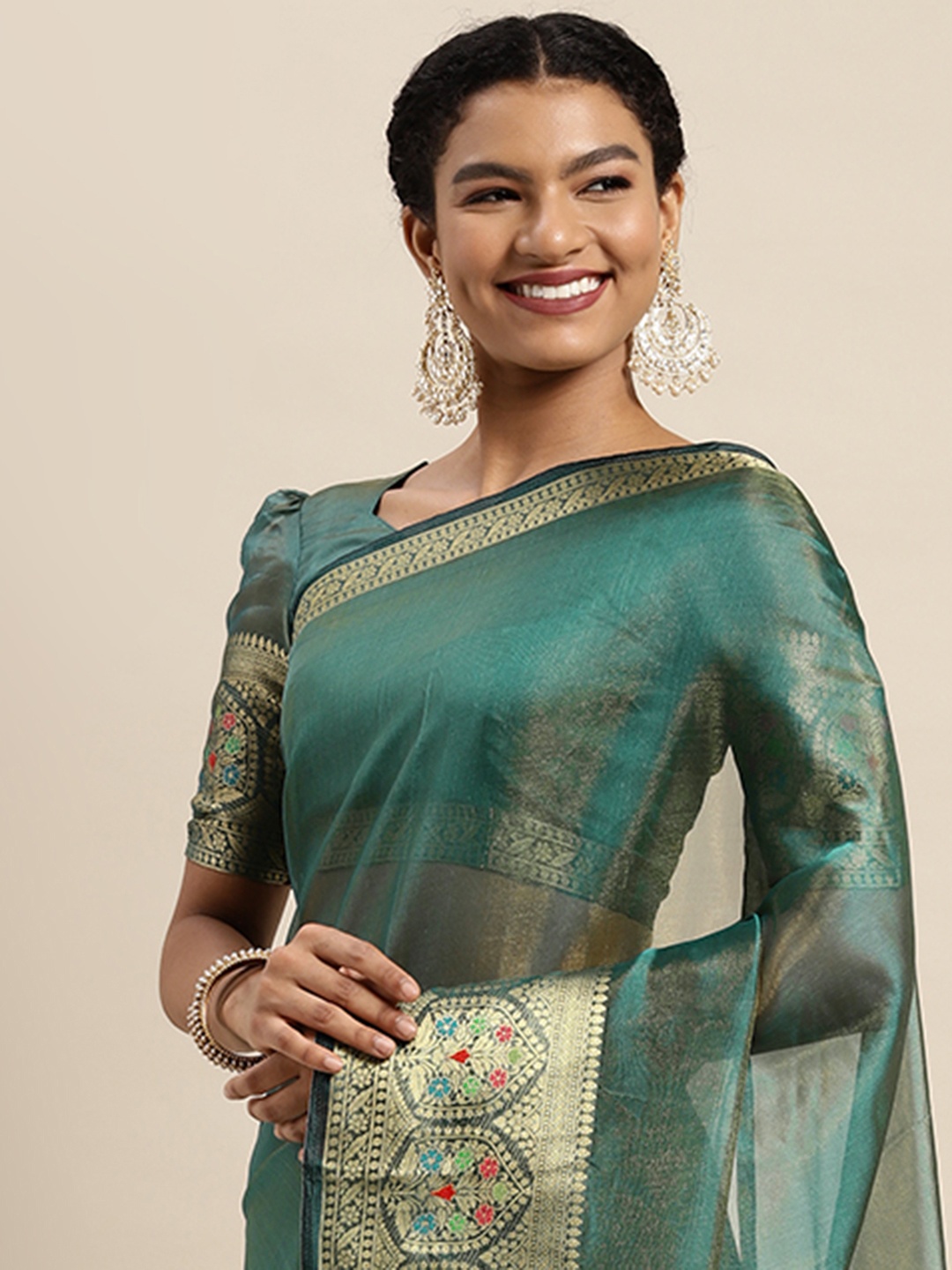 

Satrani Teal Blue Organza Banarasi Saree