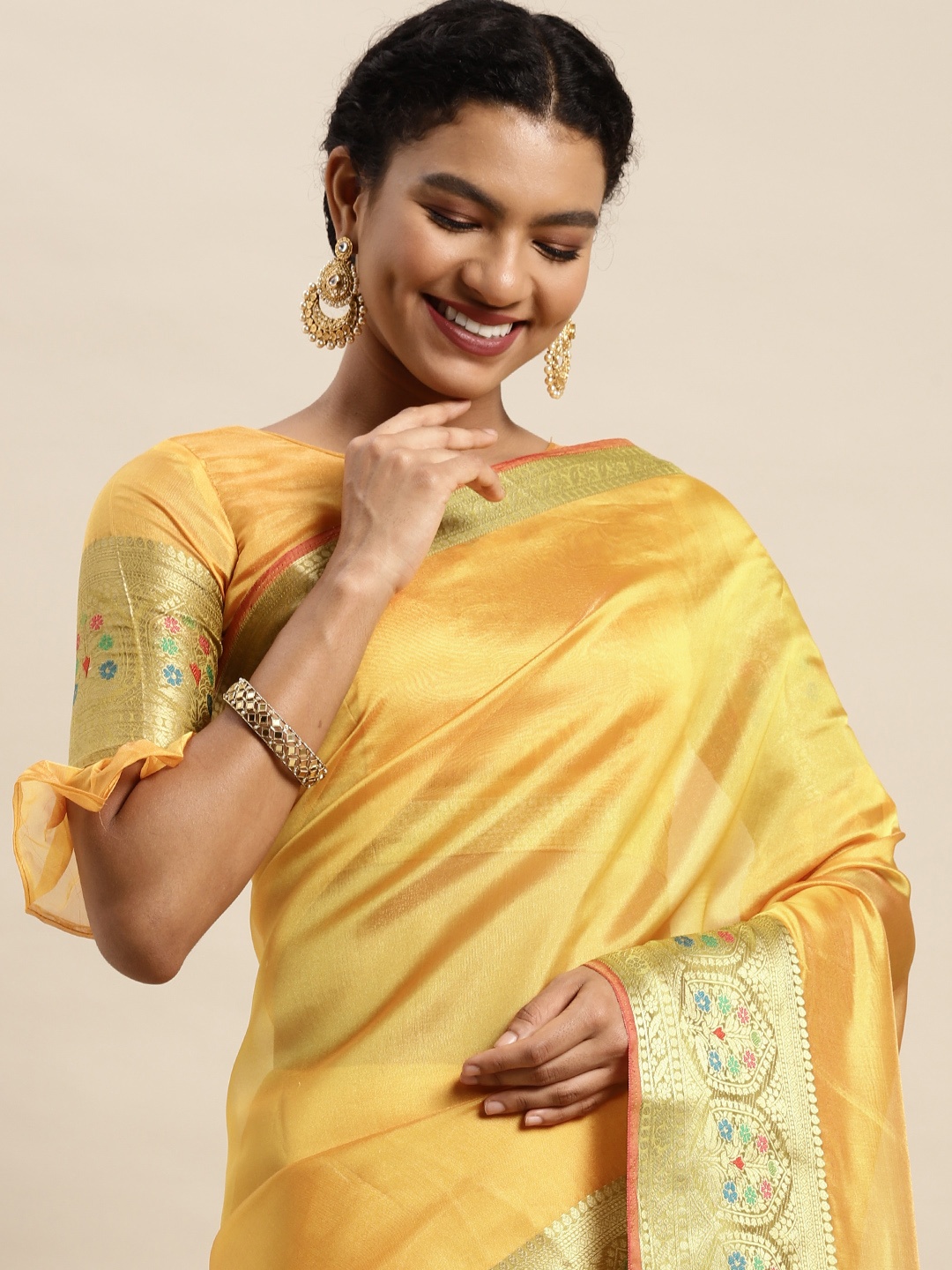 

Satrani Women Yellow Solid Dyed Organza Banarasi Saree