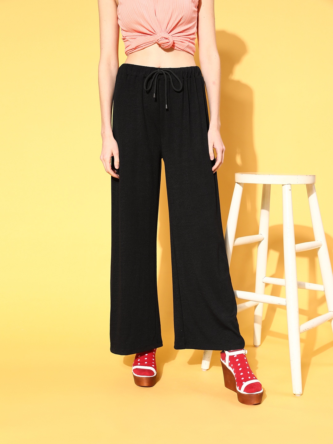 

SASSAFRAS Women Stylish Black Solid Wide Leg Bottom Track Pants