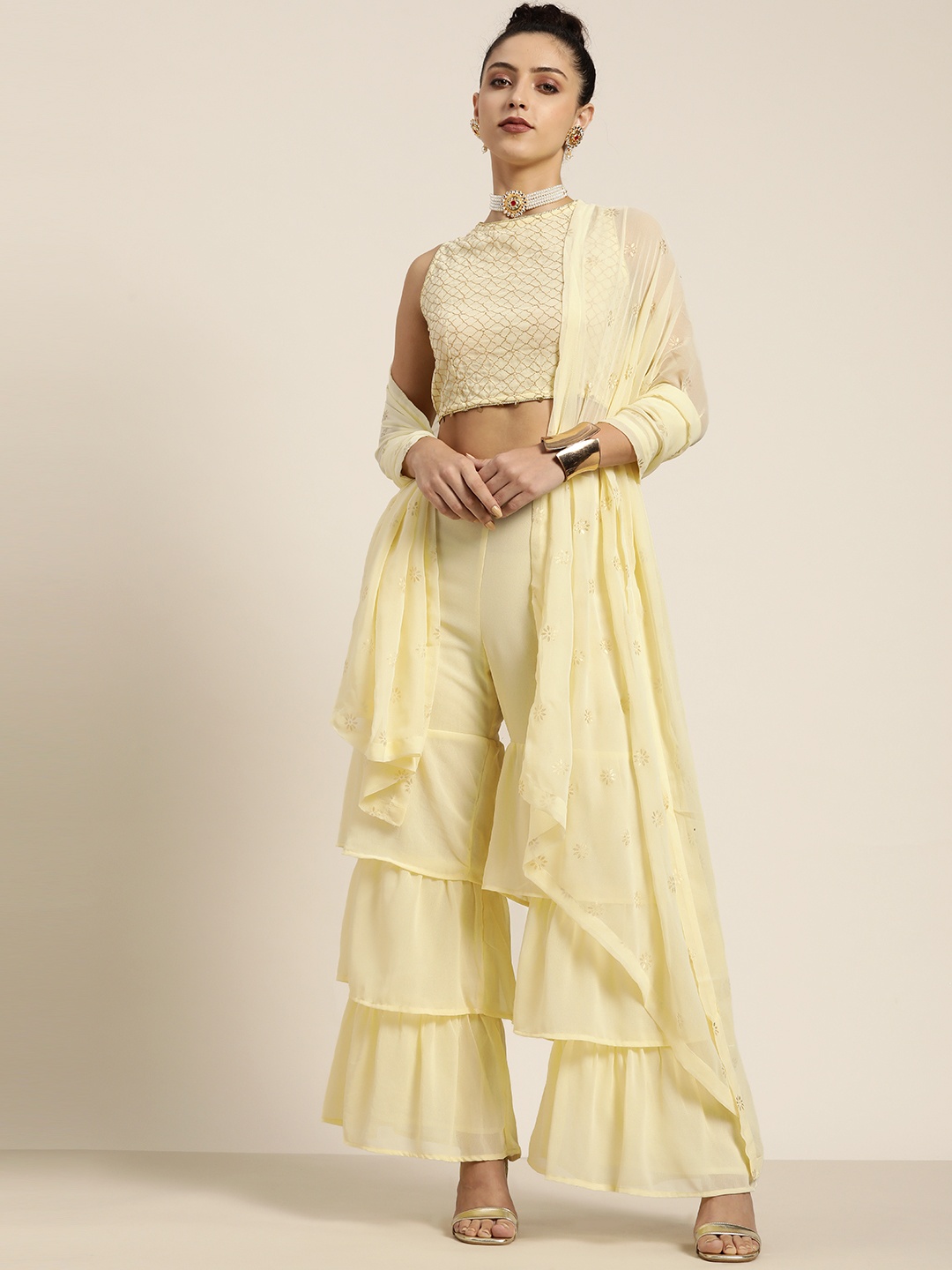 

Moda Rapido Women Yellow Embroidered Top with Sharara & With Dupatta